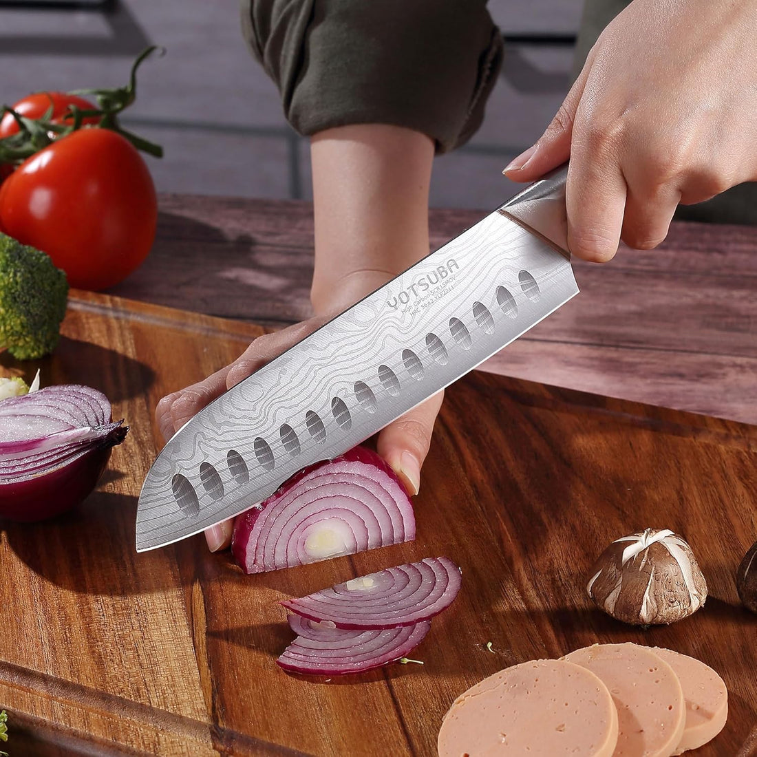 Yotsuba santoku knife with hollow edge blade and walnut wood handle